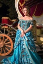 The beautiful girl in blue old-fashioned dress Royalty Free Stock Photo