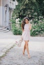 Beautiful girl with a bouquet of peonies Royalty Free Stock Photo