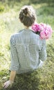 Beautiful girl with a bouquet of peonies Royalty Free Stock Photo