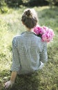 Beautiful girl with a bouquet of peonies Royalty Free Stock Photo