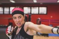 Beautiful girl boxing in the gym Royalty Free Stock Photo