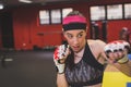 Beautiful girl boxing in the gym Royalty Free Stock Photo