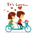 Beautiful girl and boy in love riding bicycle