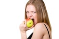 Beautiful girl with brackets eating the apple Royalty Free Stock Photo