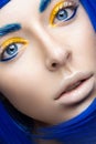 Beautiful girl in a bright blue wig in the style of cosplay and creative makeup. Beauty face. Art image. Royalty Free Stock Photo