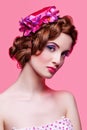 Beautiful girl with bright make-up and pink hat Royalty Free Stock Photo