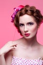 Beautiful girl with bright make-up and pink hat Royalty Free Stock Photo