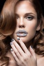 Beautiful girl with bright nails, lips of crystals Royalty Free Stock Photo