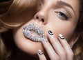 Beautiful girl with bright nails, lips of crystals Royalty Free Stock Photo