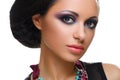 Beautiful girl with bright vivid purple and green make-up Royalty Free Stock Photo