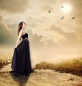 Beautiful girl at a brook under the moon light Royalty Free Stock Photo