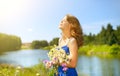 Beautiful girl with bunch of camomiles Royalty Free Stock Photo