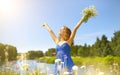 Beautiful girl with bunch of camomiles Royalty Free Stock Photo