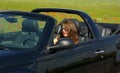 Beautiful girl in cabrio