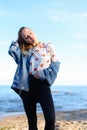 Portrait of cute young woman who poses and smiles in camera, sta Royalty Free Stock Photo