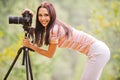 Beautiful girl with camera