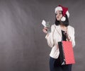 Beautiful girl cap, santa gift package money Royalty Free Stock Photo