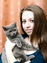 Beautiful girl with a cat on hands Royalty Free Stock Photo