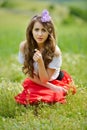 Beautiful girl on cereal field in spring Royalty Free Stock Photo