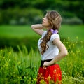 Beautiful girl on cereal field in spring Royalty Free Stock Photo