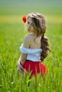 Beautiful girl on cereal field in spring Royalty Free Stock Photo