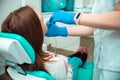 Beautiful girl in a chair at the dentist. Medical office. Dental examination