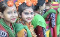 Beautiful girl children dressed to dance and celebrate holi in central park golf green, kolkata