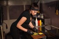 Beautiful girl Cook prepares the kitchen Burger Royalty Free Stock Photo