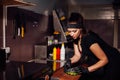 Beautiful girl Cook prepares the kitchen Burger Royalty Free Stock Photo