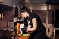 Beautiful girl Cook prepares the kitchen Burger Royalty Free Stock Photo