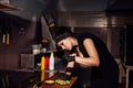 Beautiful girl Cook prepares the kitchen Burger Royalty Free Stock Photo