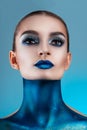 Beautiful girl with creative make-up . Bright colors blue lips. Conceptual art the cosmos, the universe Royalty Free Stock Photo