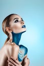 Beautiful girl with creative make-up . Bright colors blue lips. Conceptual art the cosmos, the universe Royalty Free Stock Photo