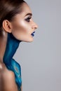 Beautiful girl with creative make-up . Bright colors blue lips. Conceptual art the cosmos, the universe Royalty Free Stock Photo