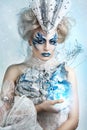 Beautiful girl with creative make-up for the new year. Winter portrait. Royalty Free Stock Photo