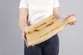 Beautiful girl. Cutting board. Young woman hold a large kitchen board in her hands. Royalty Free Stock Photo