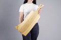 Beautiful girl. Cutting board. Young woman hold a large kitchen board in her hands. Royalty Free Stock Photo