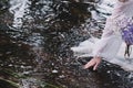 Beautiful girl in a dark forest near the river. Royalty Free Stock Photo