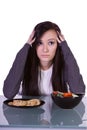 Beautiful Girl Deciding What to Eat Royalty Free Stock Photo