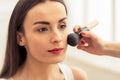 Beautiful girl doing makeup Royalty Free Stock Photo