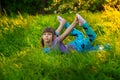 Beautiful girl doing yoga outdoors On green grass Royalty Free Stock Photo