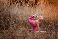 Beautiful girl doing yoga outdoors On green grass Royalty Free Stock Photo