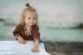 Beautiful girl with Down syndrome on the beach Royalty Free Stock Photo