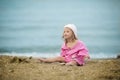 Beautiful girl with Down syndrome on the beach Royalty Free Stock Photo