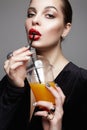 Beautiful girl drinking fresh orange juice Royalty Free Stock Photo