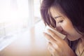 Beautiful girl drinking hot coffee or tea in coffee cafe Royalty Free Stock Photo