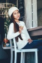 Beautiful girl drinking Martini in a bar Royalty Free Stock Photo