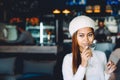 Beautiful girl drinking Martini in a bar Royalty Free Stock Photo