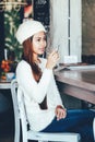 Beautiful girl drinking Martini in a bar Royalty Free Stock Photo