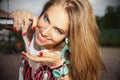 Beautiful girl drinking tap water outdoors Royalty Free Stock Photo